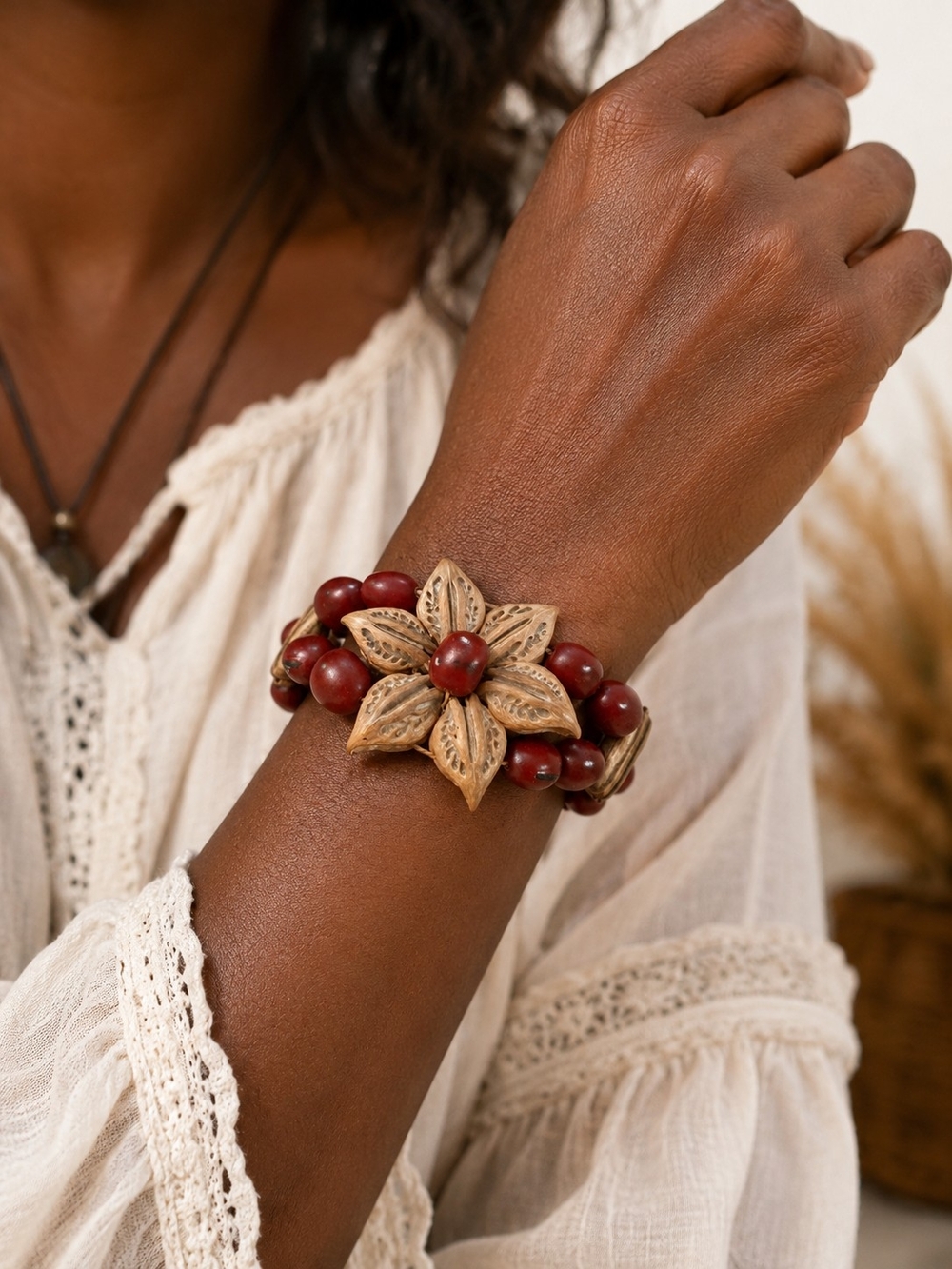 Handmade Red Bead Bracelet with Carved Flower Accent